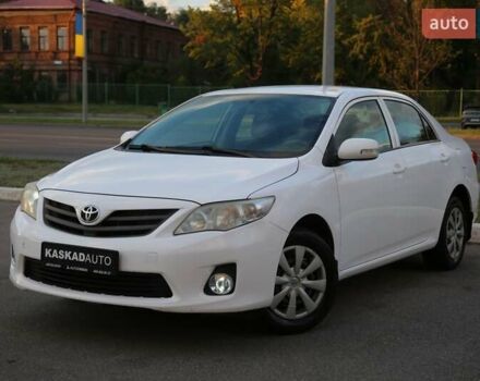 Белый Тойота Королла, объемом двигателя 1.33 л и пробегом 157 тыс. км за 7800 $, фото 1 на Automoto.ua