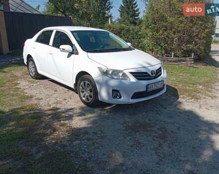 Белый Тойота Королла, объемом двигателя 1.33 л и пробегом 158 тыс. км за 7400 $, фото 1 на Automoto.ua