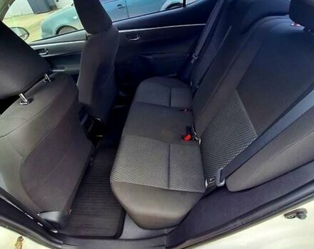 Белый Тойота Королла, объемом двигателя 1.3 л и пробегом 84 тыс. км за 10500 $, фото 1 на Automoto.ua