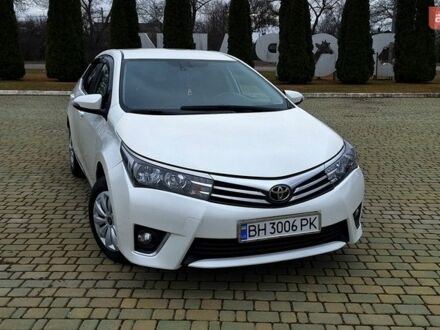 Білий Тойота Королла, об'ємом двигуна 1.6 л та пробігом 200 тис. км за 8699 $, фото 1 на Automoto.ua