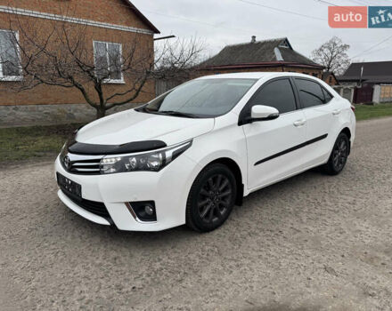 Білий Тойота Королла, об'ємом двигуна 1.6 л та пробігом 136 тис. км за 13500 $, фото 1 на Automoto.ua