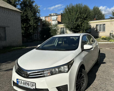 Білий Тойота Королла, об'ємом двигуна 1.6 л та пробігом 248 тис. км за 11000 $, фото 1 на Automoto.ua