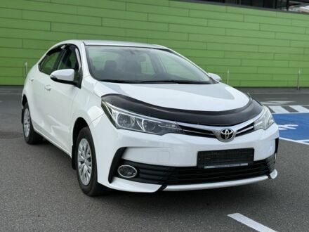 Белый Тойота Королла, объемом двигателя 1.6 л и пробегом 169 тыс. км за 9900 $, фото 1 на Automoto.ua