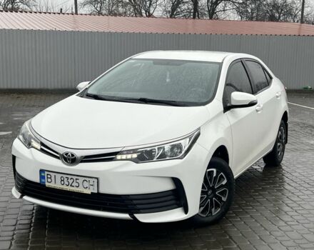 Білий Тойота Королла, об'ємом двигуна 1.3 л та пробігом 67 тис. км за 11850 $, фото 1 на Automoto.ua