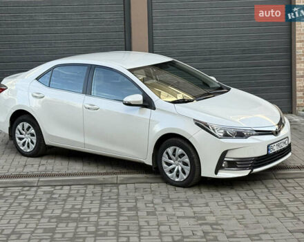 Білий Тойота Королла, об'ємом двигуна 1.6 л та пробігом 131 тис. км за 13500 $, фото 1 на Automoto.ua
