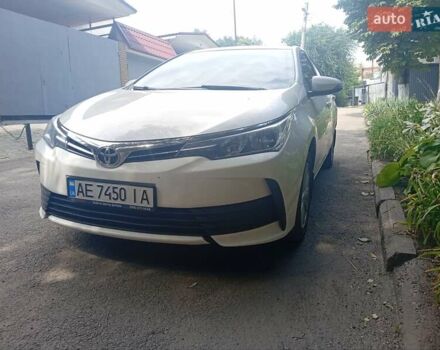 Білий Тойота Королла, об'ємом двигуна 1.6 л та пробігом 113 тис. км за 11700 $, фото 1 на Automoto.ua