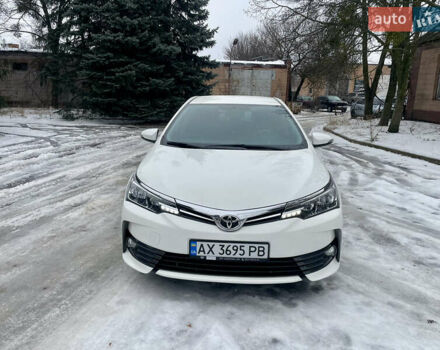 Белый Тойота Королла, объемом двигателя 1.6 л и пробегом 84 тыс. км за 14800 $, фото 1 на Automoto.ua