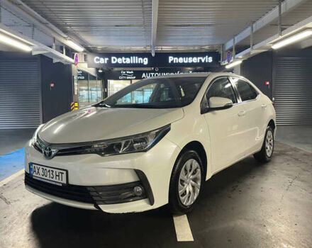 Білий Тойота Королла, об'ємом двигуна 1.6 л та пробігом 123 тис. км за 12900 $, фото 1 на Automoto.ua