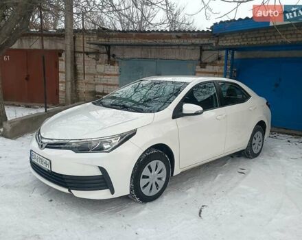 Білий Тойота Королла, об'ємом двигуна 1.33 л та пробігом 83 тис. км за 10999 $, фото 1 на Automoto.ua