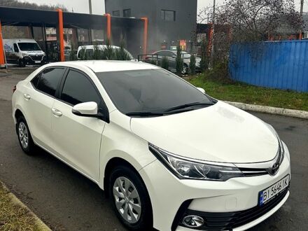 Білий Тойота Королла, об'ємом двигуна 1.6 л та пробігом 205 тис. км за 13700 $, фото 1 на Automoto.ua