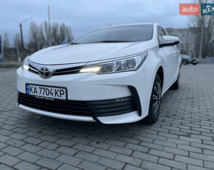 Білий Тойота Королла, об'ємом двигуна 1.6 л та пробігом 176 тис. км за 12999 $, фото 1 на Automoto.ua