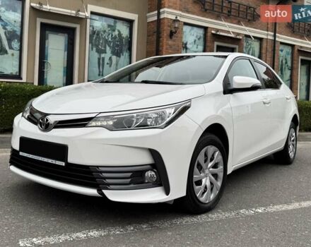 Білий Тойота Королла, об'ємом двигуна 1.6 л та пробігом 45 тис. км за 18000 $, фото 1 на Automoto.ua