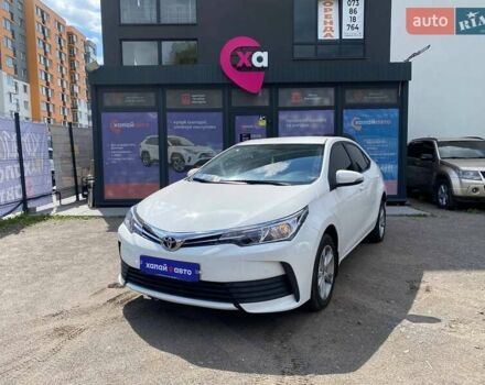 Білий Тойота Королла, об'ємом двигуна 1.6 л та пробігом 155 тис. км за 13250 $, фото 1 на Automoto.ua