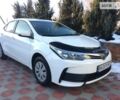 Білий Тойота Королла, об'ємом двигуна 1.33 л та пробігом 47 тис. км за 12900 $, фото 1 на Automoto.ua