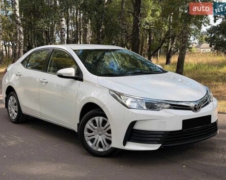 Белый Тойота Королла, объемом двигателя 1.6 л и пробегом 128 тыс. км за 10950 $, фото 1 на Automoto.ua