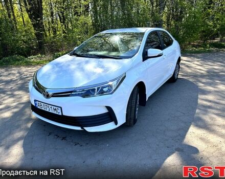 Белый Тойота Королла, объемом двигателя 1.3 л и пробегом 163 тыс. км за 11000 $, фото 1 на Automoto.ua