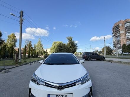 Белый Тойота Королла, объемом двигателя 1.6 л и пробегом 118 тыс. км за 16058 $, фото 1 на Automoto.ua