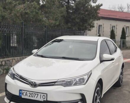 Білий Тойота Королла, об'ємом двигуна 1.6 л та пробігом 161 тис. км за 13700 $, фото 1 на Automoto.ua