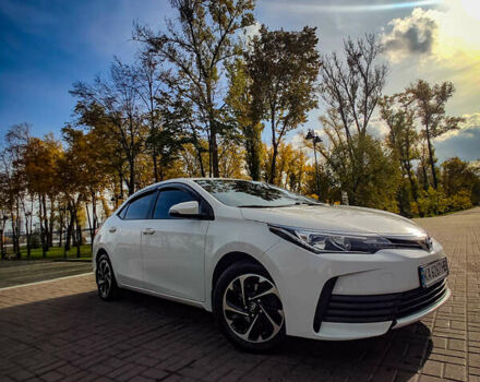 Білий Тойота Королла, об'ємом двигуна 1.33 л та пробігом 215 тис. км за 10600 $, фото 1 на Automoto.ua