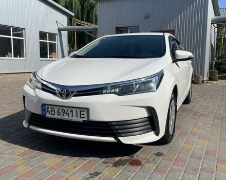 Білий Тойота Королла, об'ємом двигуна 1.6 л та пробігом 103 тис. км за 13000 $, фото 1 на Automoto.ua