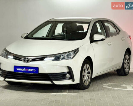 Белый Тойота Королла, объемом двигателя 1.6 л и пробегом 166 тыс. км за 12400 $, фото 1 на Automoto.ua