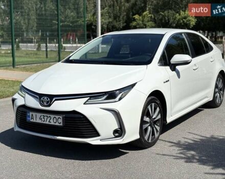 Білий Тойота Королла, об'ємом двигуна 1.8 л та пробігом 137 тис. км за 19000 $, фото 1 на Automoto.ua