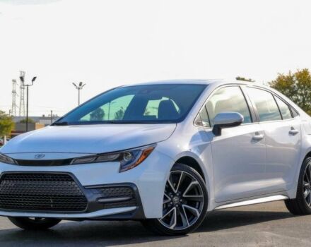 Белый Тойота Королла, объемом двигателя 2 л и пробегом 14 тыс. км за 7000 $, фото 1 на Automoto.ua