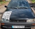 Черный Тойота Королла, объемом двигателя 1.3 л и пробегом 607 тыс. км за 1574 $, фото 5 на Automoto.ua