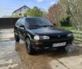 Черный Тойота Королла, объемом двигателя 1.3 л и пробегом 200 тыс. км за 900 $, фото 1 на Automoto.ua