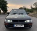 Черный Тойота Королла, объемом двигателя 1.3 л и пробегом 497 тыс. км за 3000 $, фото 1 на Automoto.ua