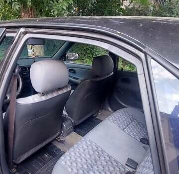 Черный Тойота Королла, объемом двигателя 1.33 л и пробегом 278 тыс. км за 2200 $, фото 6 на Automoto.ua