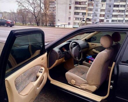 Черный Тойота Королла, объемом двигателя 1.4 л и пробегом 221 тыс. км за 2600 $, фото 4 на Automoto.ua