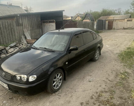 Чорний Тойота Королла, об'ємом двигуна 2 л та пробігом 316 тис. км за 3600 $, фото 1 на Automoto.ua