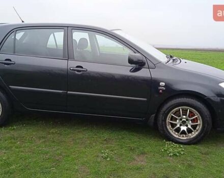 Черный Тойота Королла, объемом двигателя 2 л и пробегом 330 тыс. км за 3600 $, фото 8 на Automoto.ua