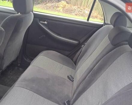 Черный Тойота Королла, объемом двигателя 2 л и пробегом 330 тыс. км за 3600 $, фото 6 на Automoto.ua