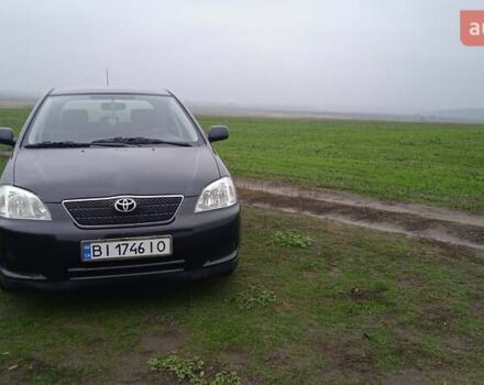 Черный Тойота Королла, объемом двигателя 2 л и пробегом 330 тыс. км за 3600 $, фото 1 на Automoto.ua