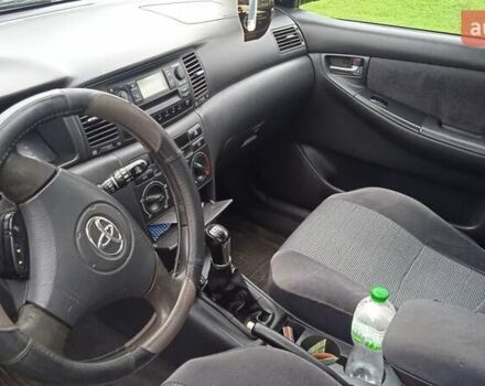 Черный Тойота Королла, объемом двигателя 2 л и пробегом 330 тыс. км за 3600 $, фото 7 на Automoto.ua