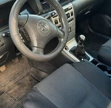 Черный Тойота Королла, объемом двигателя 1.6 л и пробегом 204 тыс. км за 4350 $, фото 7 на Automoto.ua