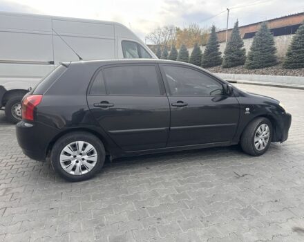 Чорний Тойота Королла, об'ємом двигуна 2 л та пробігом 311 тис. км за 3300 $, фото 1 на Automoto.ua