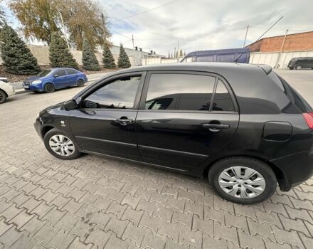 Чорний Тойота Королла, об'ємом двигуна 2 л та пробігом 311 тис. км за 3300 $, фото 3 на Automoto.ua