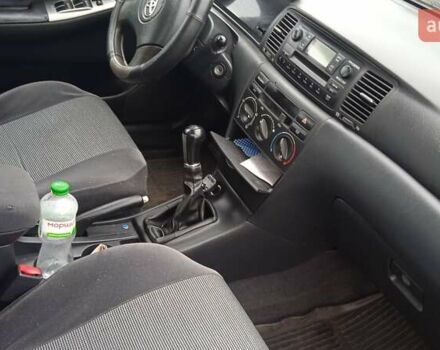 Черный Тойота Королла, объемом двигателя 2 л и пробегом 330 тыс. км за 3600 $, фото 5 на Automoto.ua