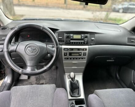 Черный Тойота Королла, объемом двигателя 2 л и пробегом 290 тыс. км за 1650 $, фото 7 на Automoto.ua