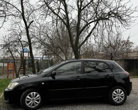 Чорний Тойота Королла, об'ємом двигуна 2 л та пробігом 300 тис. км за 4200 $, фото 4 на Automoto.ua
