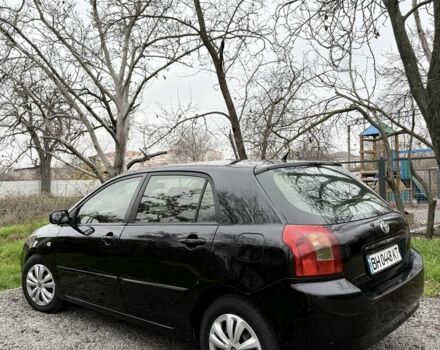 Чорний Тойота Королла, об'ємом двигуна 2 л та пробігом 300 тис. км за 4200 $, фото 1 на Automoto.ua