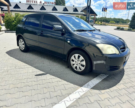 Черный Тойота Королла, объемом двигателя 1.36 л и пробегом 207 тыс. км за 4950 $, фото 2 на Automoto.ua