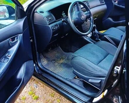 Черный Тойота Королла, объемом двигателя 1.6 л и пробегом 187 тыс. км за 5250 $, фото 2 на Automoto.ua