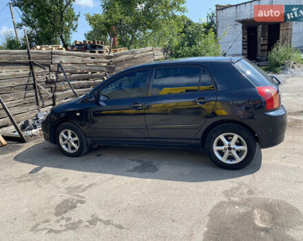 Чорний Тойота Королла, об'ємом двигуна 1.6 л та пробігом 271 тис. км за 6200 $, фото 1 на Automoto.ua