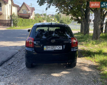Чорний Тойота Королла, об'ємом двигуна 1.6 л та пробігом 271 тис. км за 6200 $, фото 6 на Automoto.ua