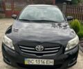 Черный Тойота Королла, объемом двигателя 1.6 л и пробегом 213 тыс. км за 7500 $, фото 1 на Automoto.ua