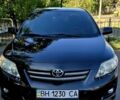 Чорний Тойота Королла, об'ємом двигуна 0 л та пробігом 56 тис. км за 9300 $, фото 8 на Automoto.ua